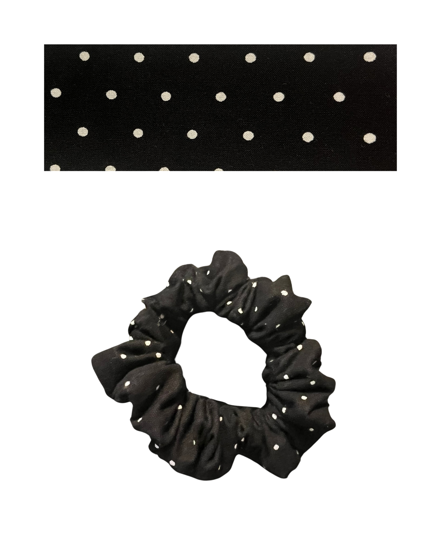 Black scrunchie with white polka dots on a white background