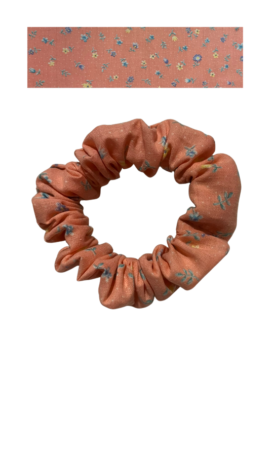 Coral/peach with blue and yellow flowers