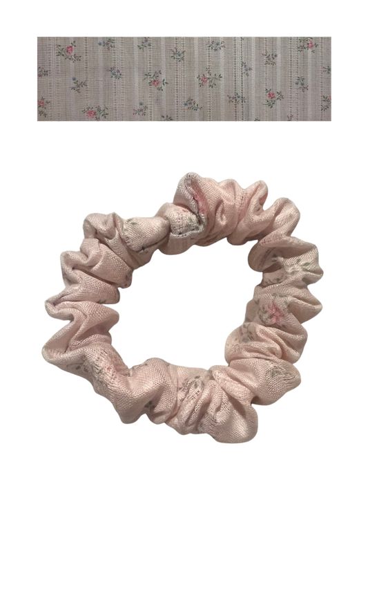 Soft pink with subtle floral stripes