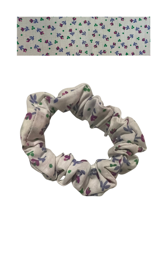 Cream with miniature purple and green flowers
