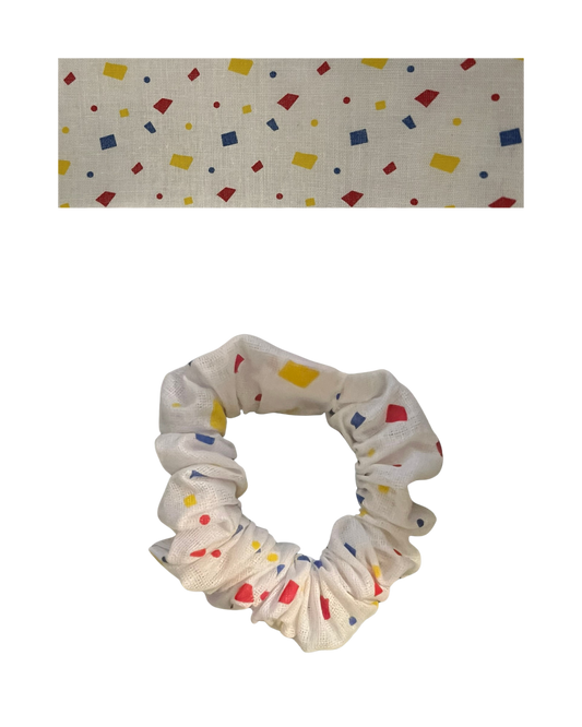 White with primary color confetti