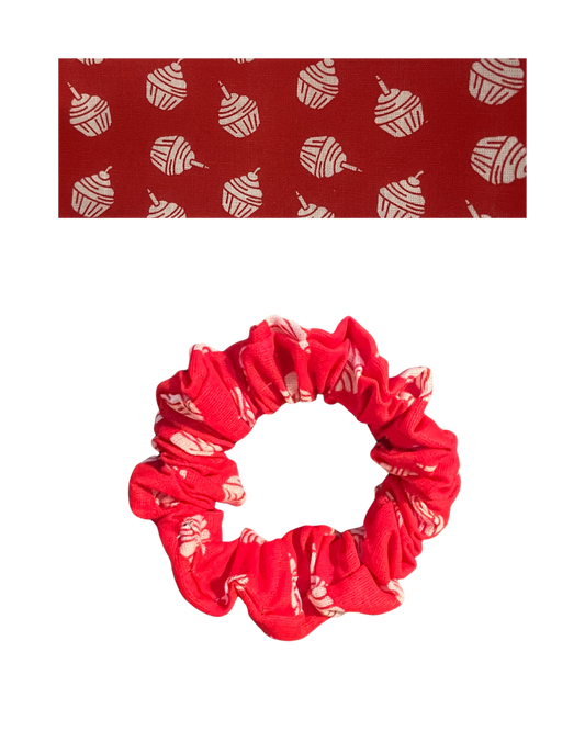 Red with white cupcakes with a candle