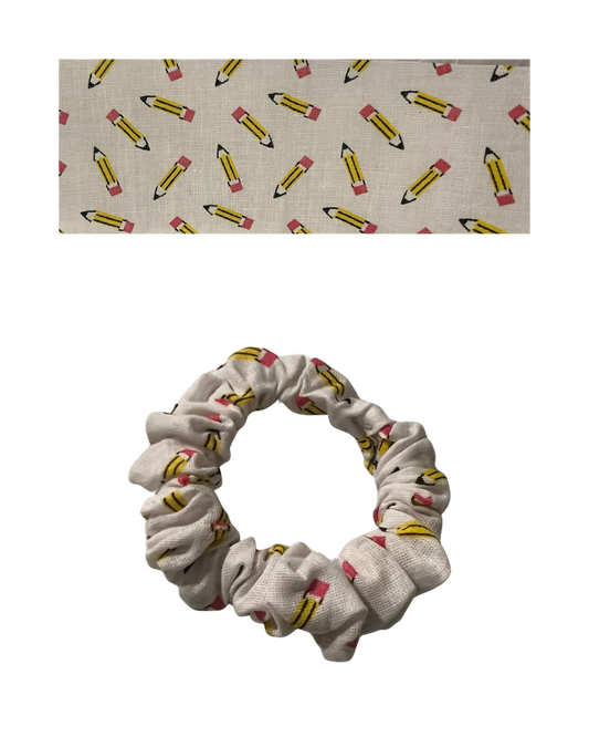 White Fabric with yellow pencils