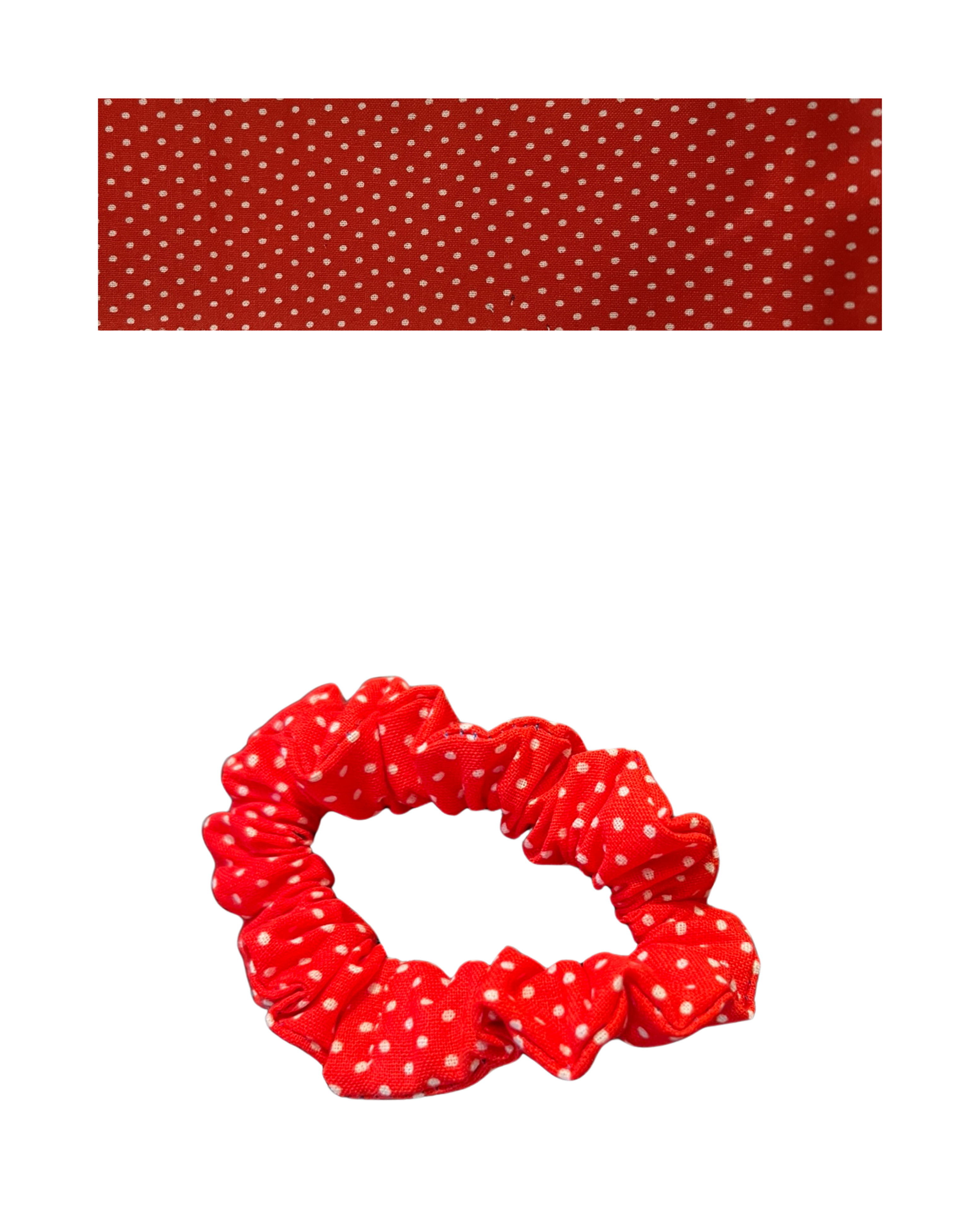Red scrunchie with a white polka dot pattern.