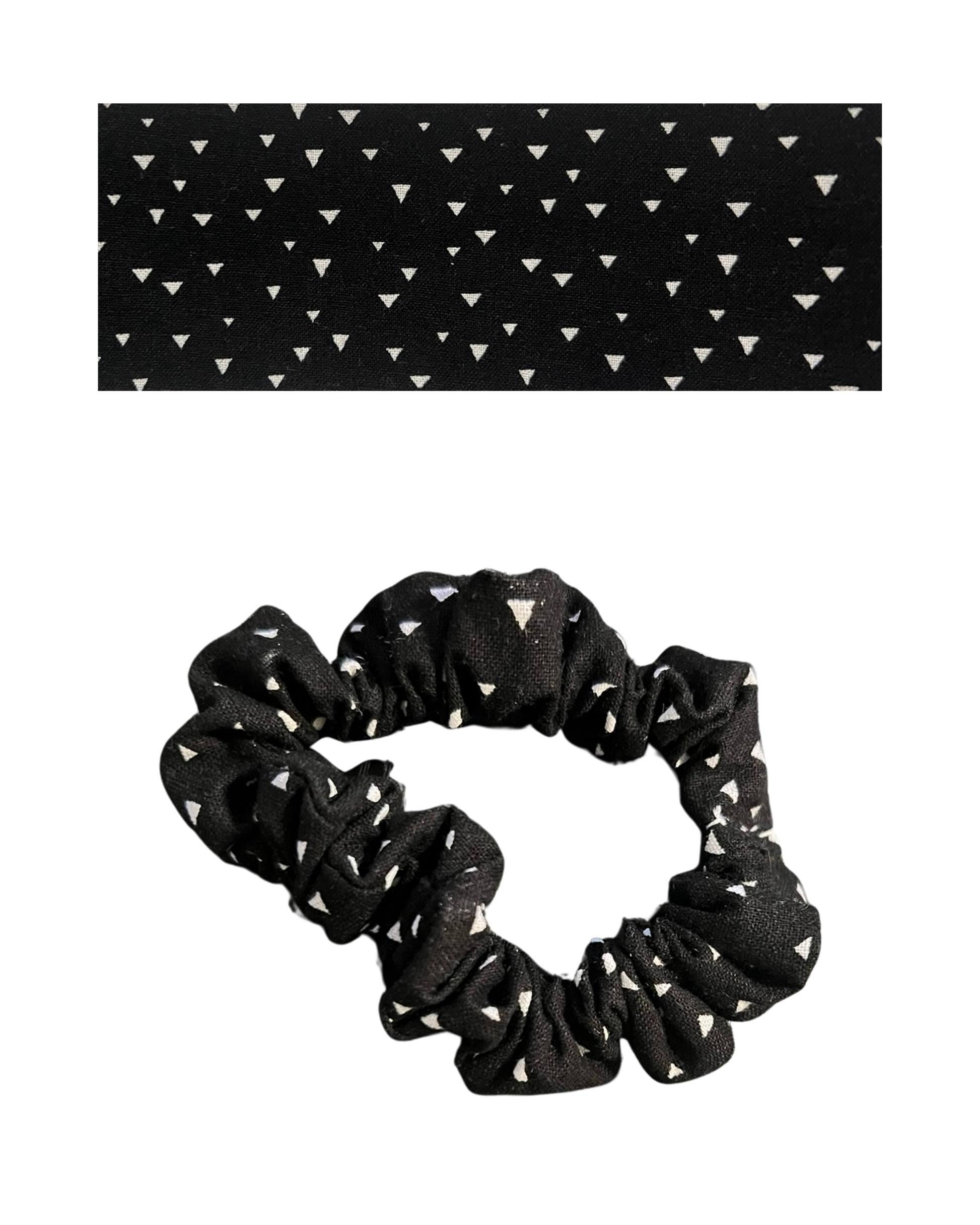 Black scrunchie with white triangle pattern on a white background