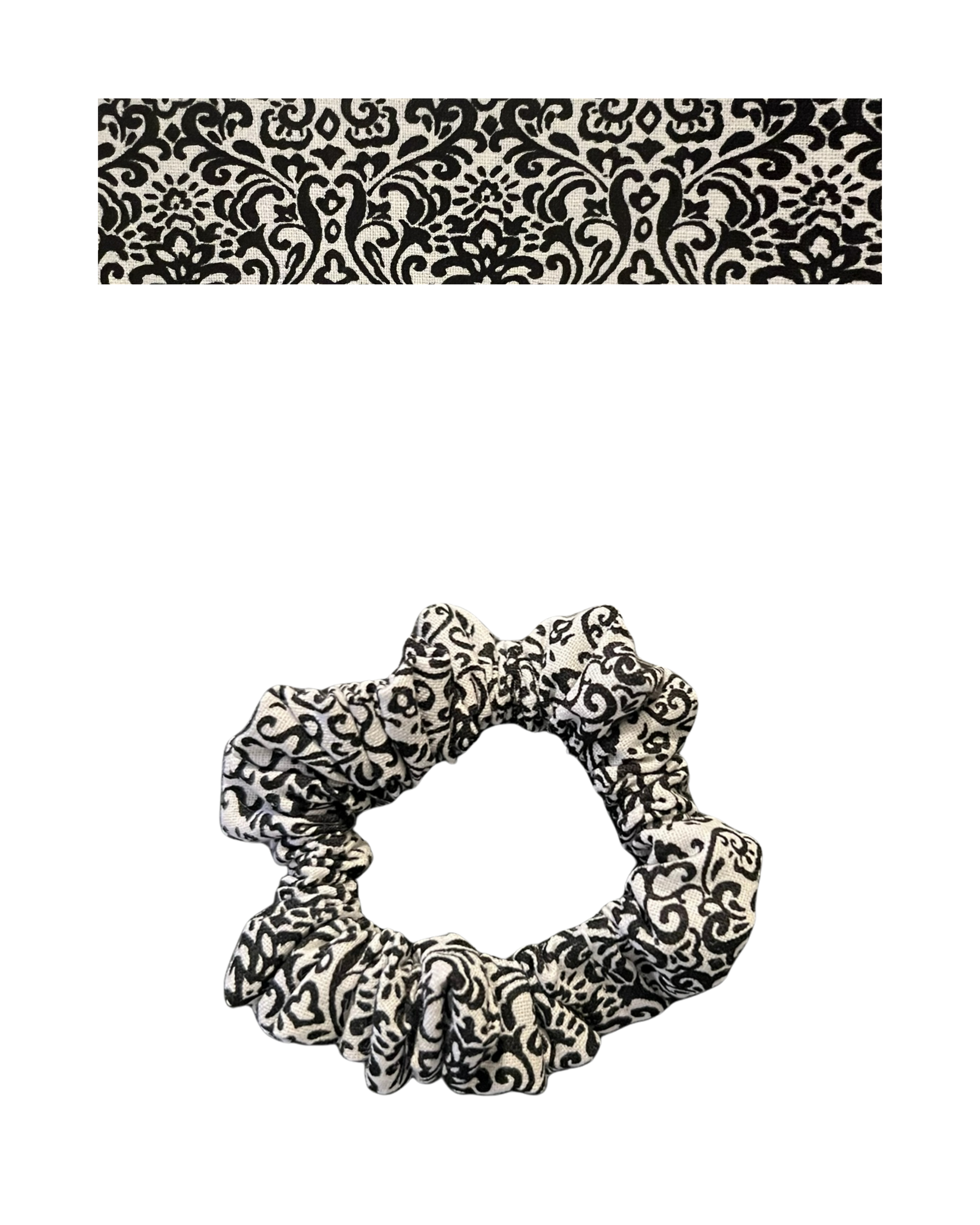 Black patterned scrunchie on a white background