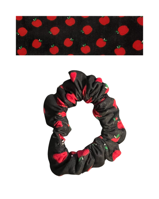 Black fabric with red apples